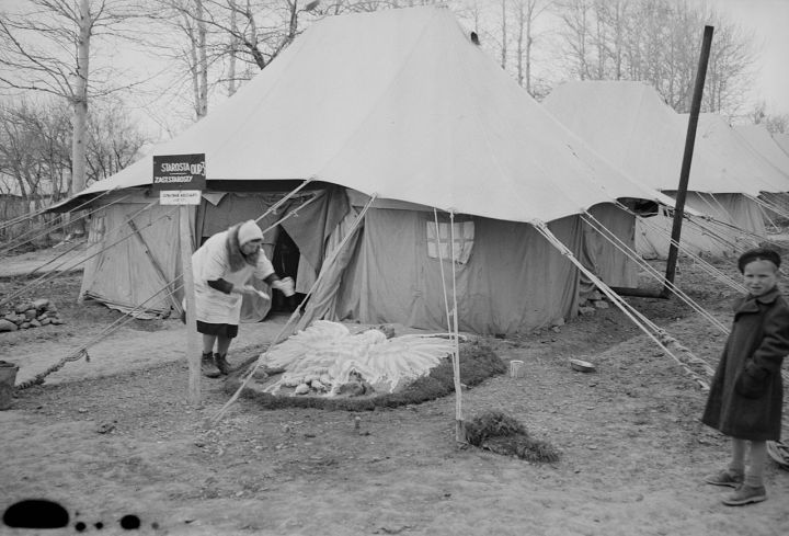 Teheran, Iran. Polish woman decorating her front yard with design of Polish eagle at an evacuation camp operated by the Red Cross.jpg