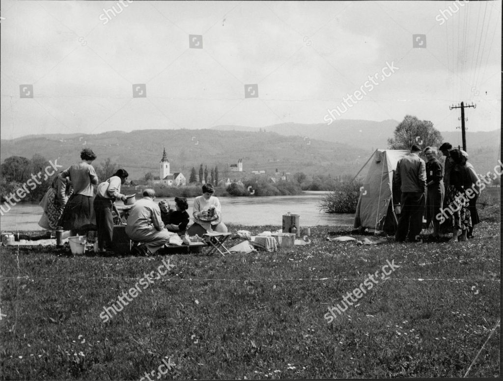Mandatory Credit: Photo by Geoff Blythe/ANL/Shutterstock (1460231a)
London To Calcutta Bus Trip 1957 (london To India By Bus) The Coach Full Of 20 British Stop For A Picnic By The River In Yugoslavia During Their Trip 
London To Calcutta Bus Trip 1957 (london To India By Bus) The Coach Full Of 20 British Stop For A Picnic By The River In Yugoslavia During Their Trip
